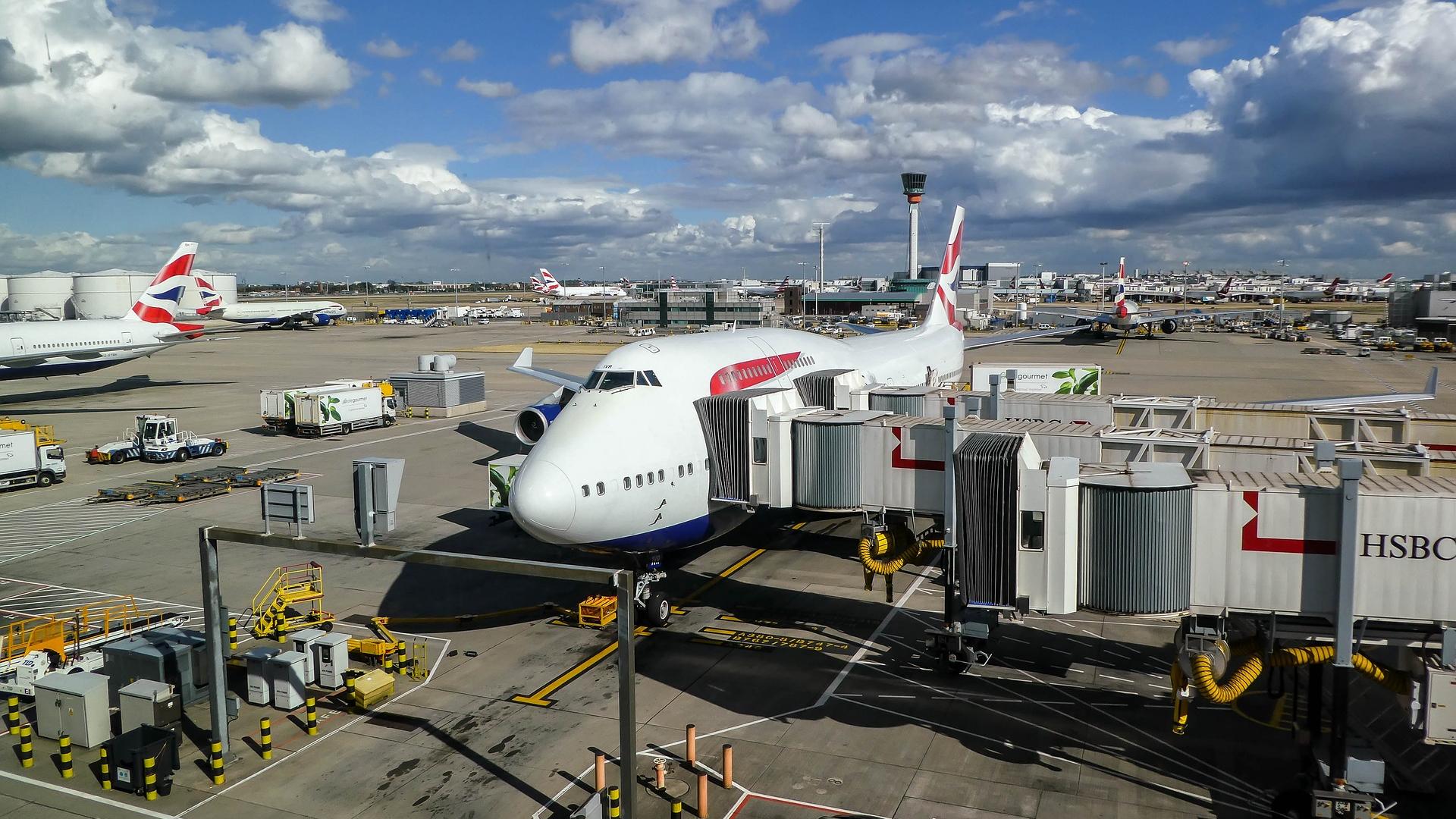 Plane on stand at Heathrow Airport