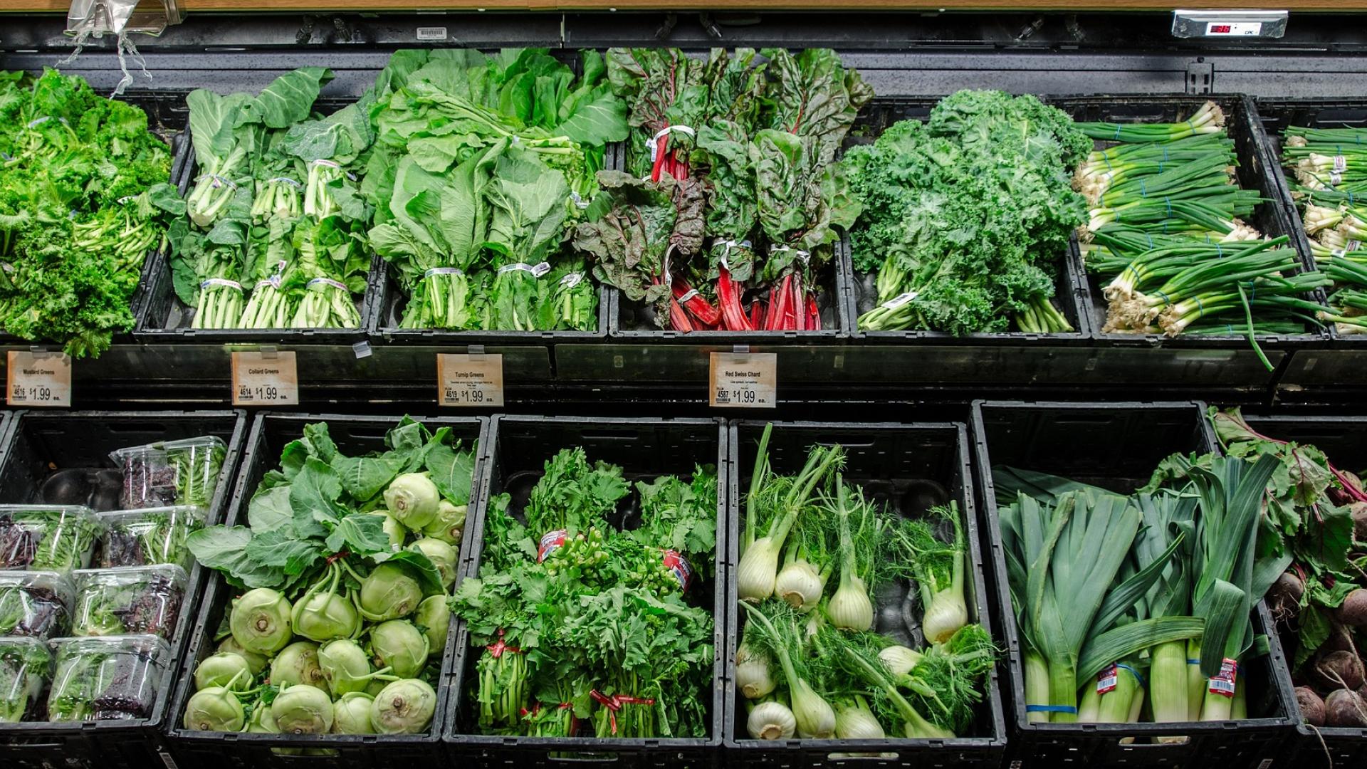 Fresh green salad vegetables in a shop display 