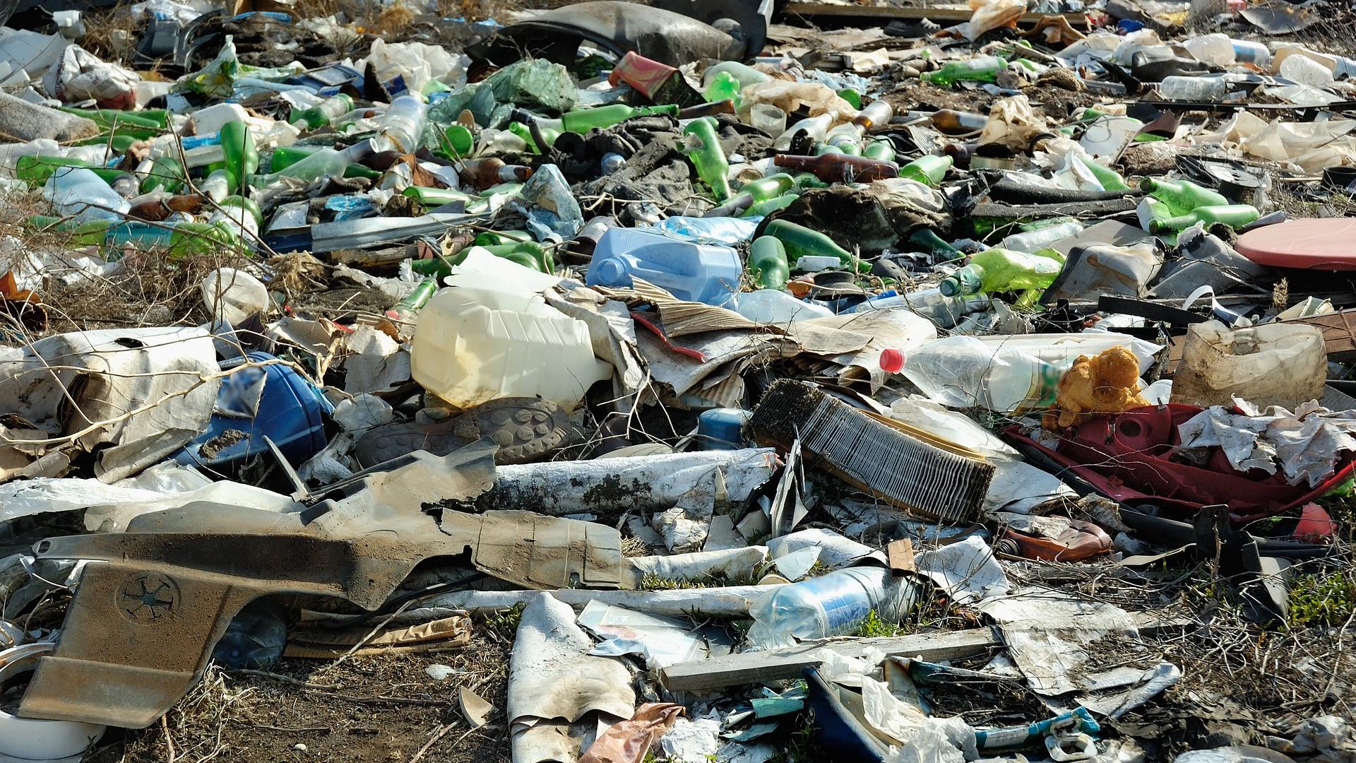 Heap of plastic garbage spread on beach