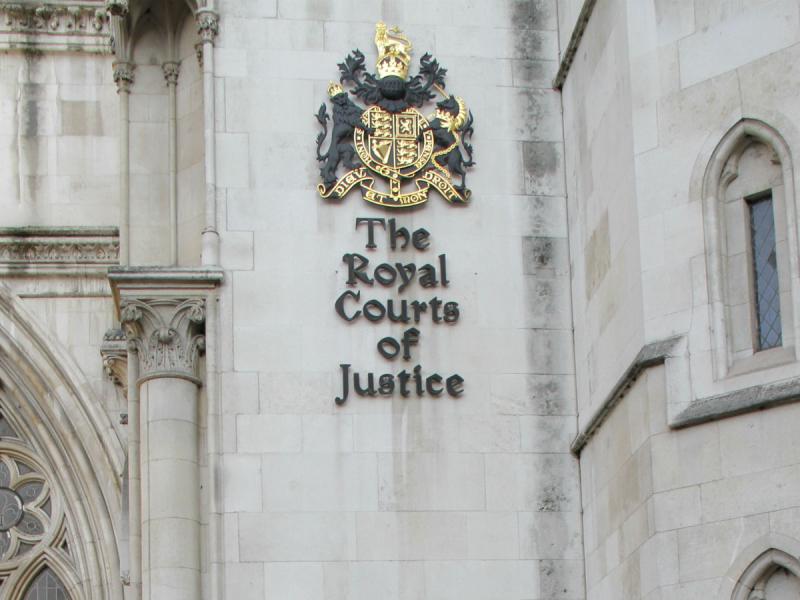 Close up of Royal Courts of Justice name plate