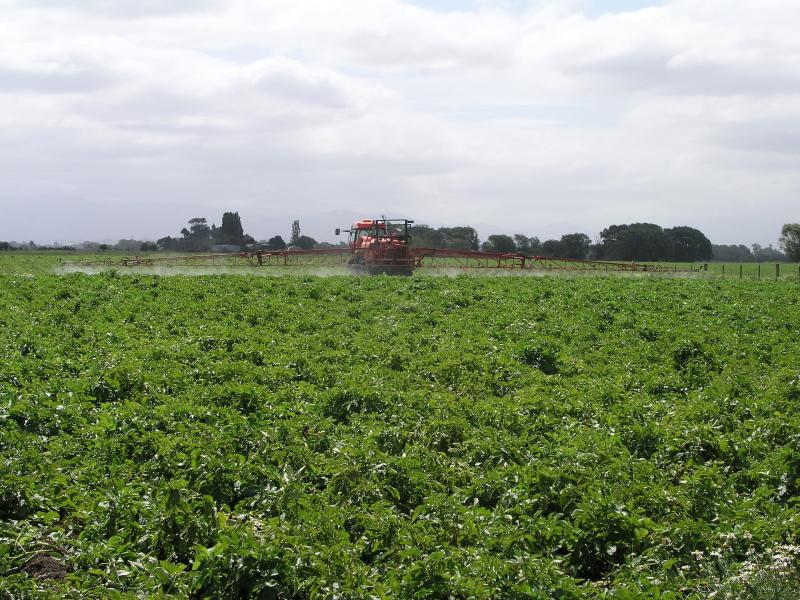 Crop spraying with pesticide