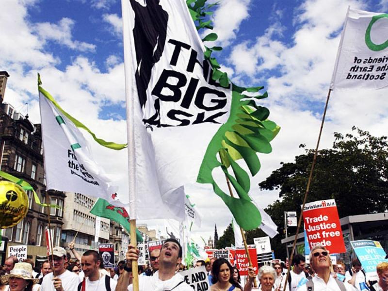 The Big Ask banners carried above marchers' heads in the Make Poverty History march, Edinburgh, July 2005