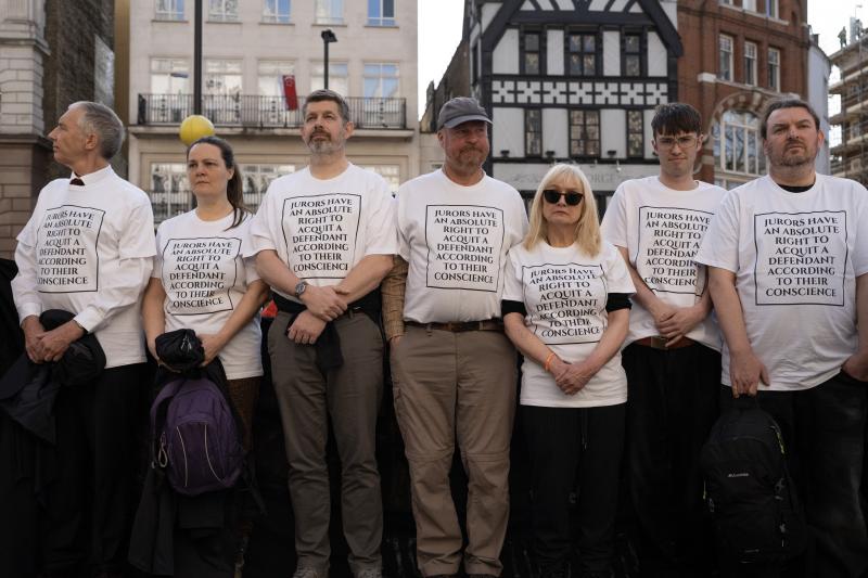 Activists gather outside the Royal Courts of Justice, London, to hear the outcome of Friends of the Earth's intervention on the sentencing of 16 JSO activists. 6 of the 16 protestors have had their sentences reduced, on the basis they were manifestly excessive. 7th March 2025.