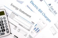 picture of energy bills plus calculator