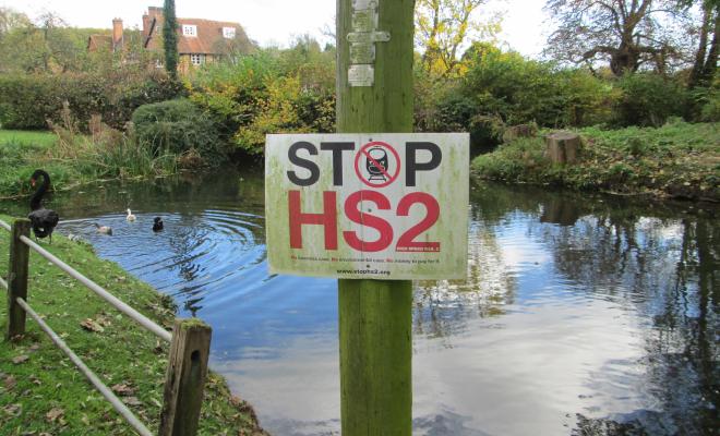 Stop HS2 sign next to the duck pond in Little Missenden