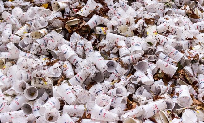Close-up of heap of discarded plastic cups