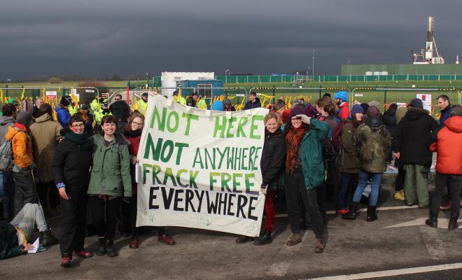 Peaceful protest by anti-fracking demonstrators outside gates of Cuadrilla's fracking site at Preston New Road